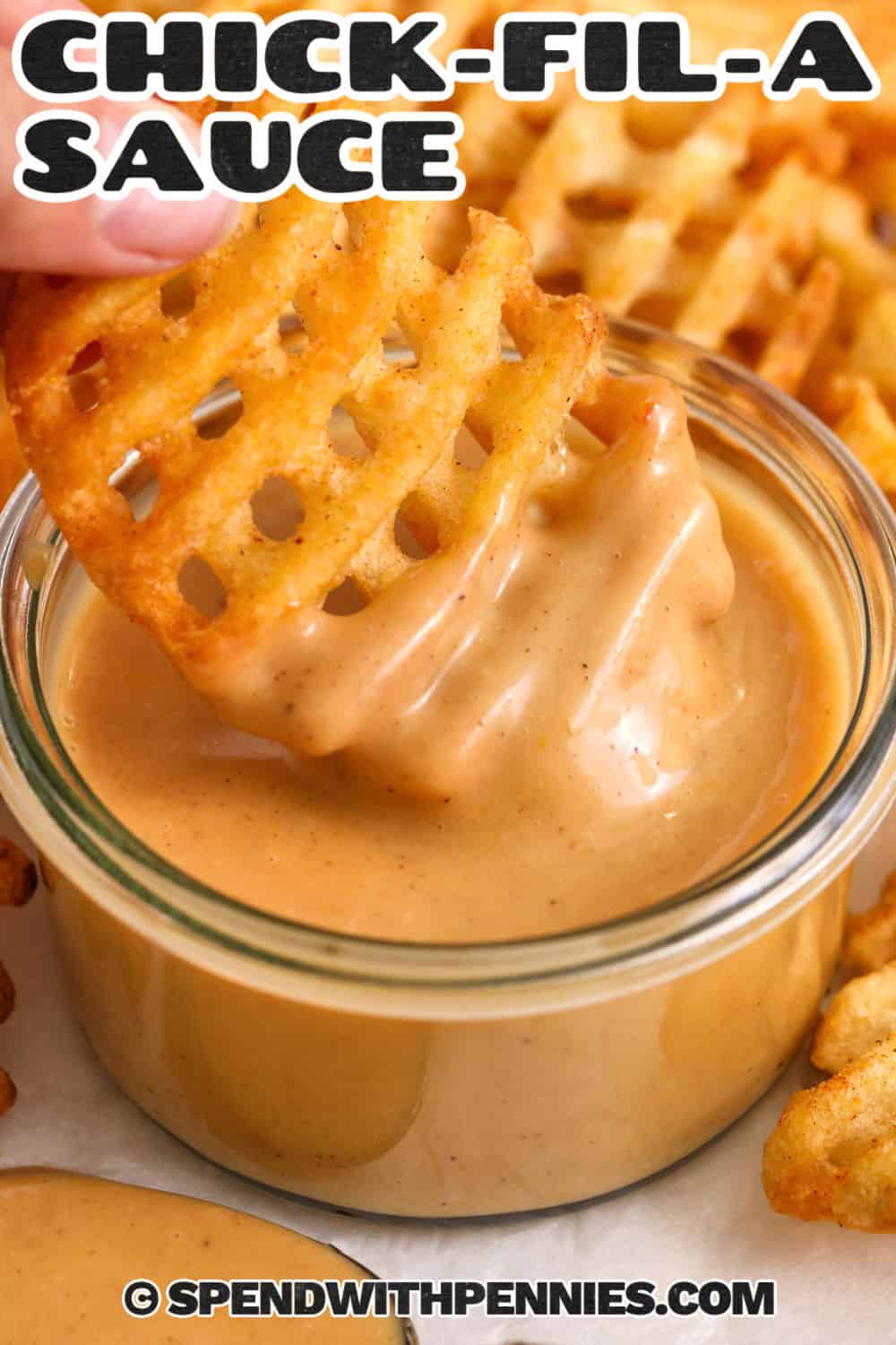 dipping waffle fries in Chick-Fil-A Sauce with a title.