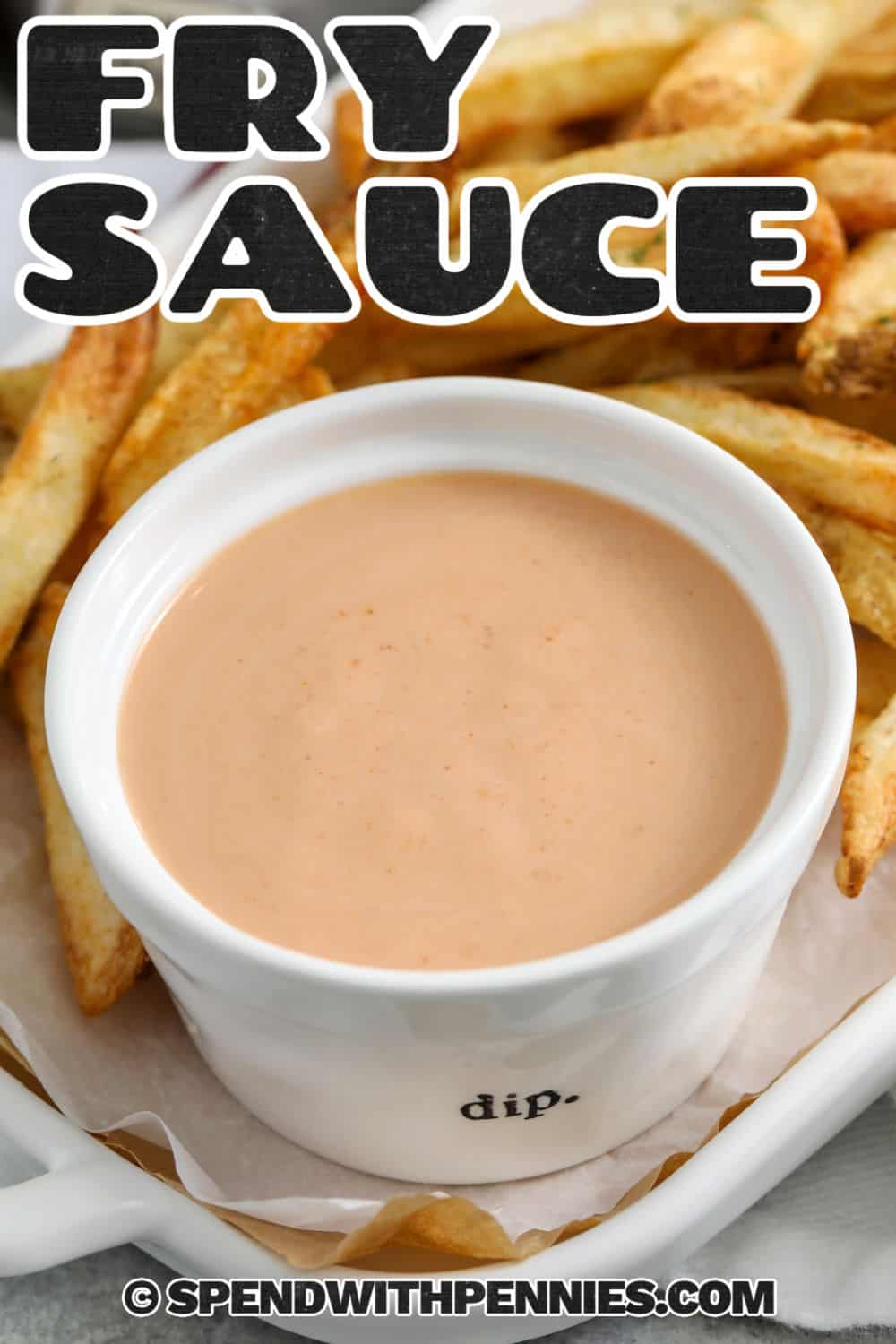 Make French fry sauce at home with a handful of familiar refrigerator and pantry ingredients. Mayonnaise keeps it rich and creamy, ketchup adds sweetness and tang, and dill pickle juice balances everything with a savory bite. Smoked paprika gives the finished dip extra depth without adding much heat. Serve this simple sauce with crispy fries, burgers, chicken tenders, or onion rings. Pin this French fry dipping sauce for an easy dinner upgrade. #spendwithpennies dish of Fry Sauce with fries and a title.