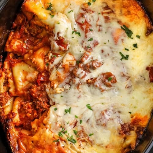 close up of cheesy Crockpot Ravioli Lasagna.
