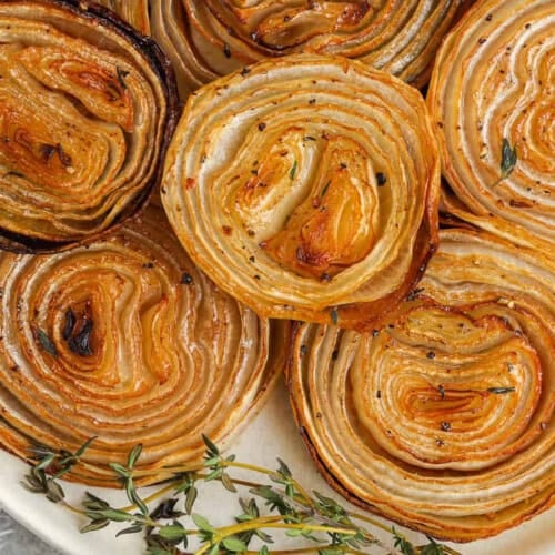 Roasted Onions on a plate close up.