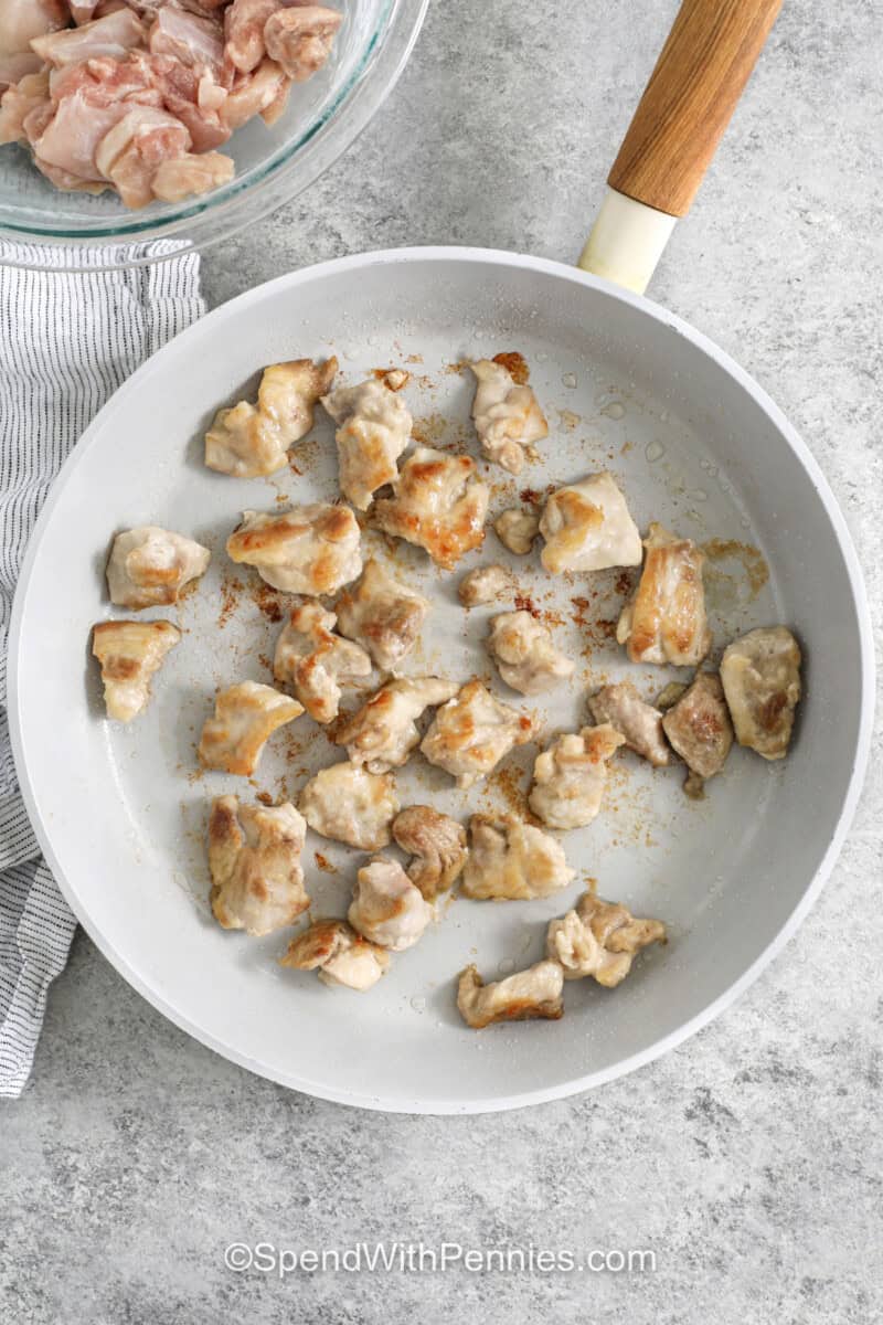 cooked chicken in a pan to make Gochujang Chicken.