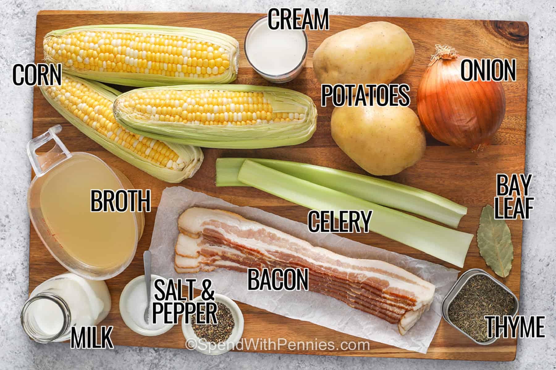 This creamy corn chowder recipe with potatoes and bacon is easy enough for a family dinner but packed with plenty of savory flavor. The vegetables cook in reserved bacon drippings before simmering with chicken broth, thyme, corn, milk, and cream. Fresh or frozen corn makes this recipe easy to prepare in any season. Save this corn chowder recipe and serve it with warm biscuits or crusty bread. #spendwithpennies corn , cream, potatoes , onion , bay leaf , celery , broth , bacon , milk , thyme , salt and pepper with labels to make Corn Chowder Recipe.