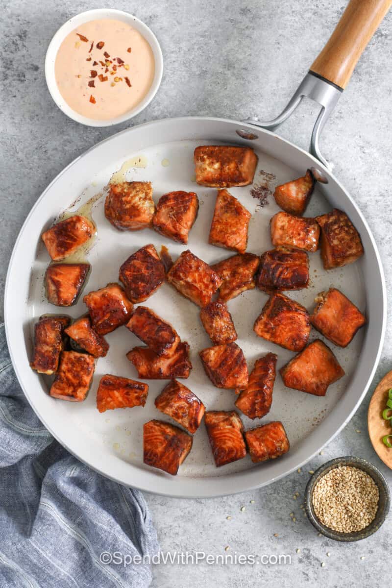 Salmon Bites in a skillet.